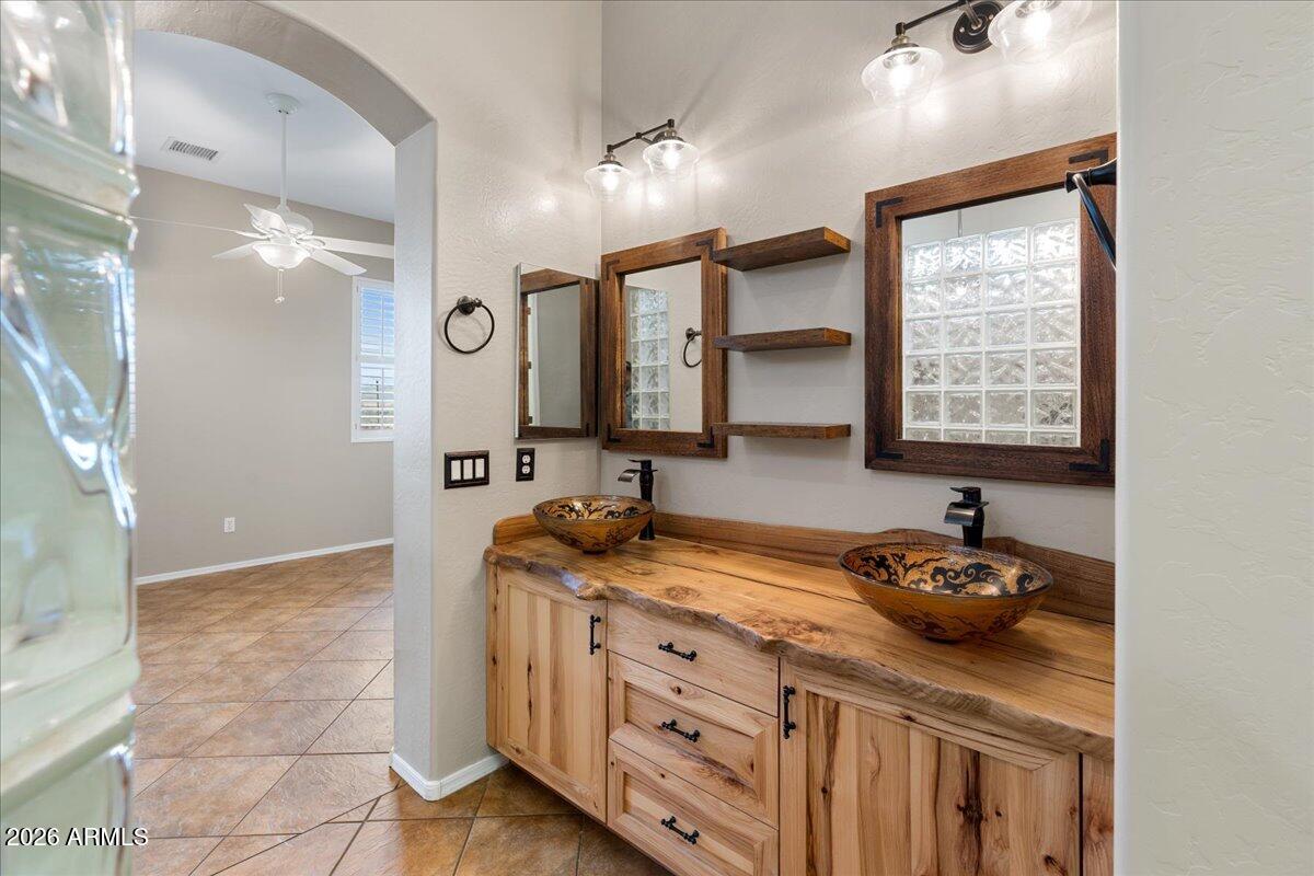 892 West Deep Gorge Road Camp Verde, AZ 86322 - Photo 21 of 38 a bathroom with a double vanity sink and a mirror