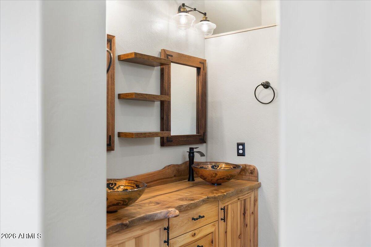 892 West Deep Gorge Road Camp Verde, AZ 86322 - Photo 22 of 38 a bathroom with a sink and a mirror