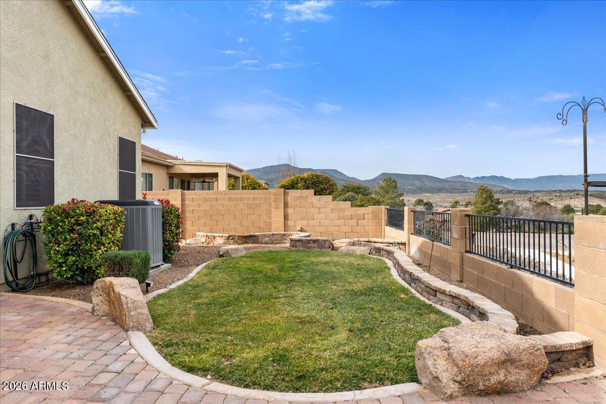 892 West Deep Gorge Road Camp Verde, AZ 86322 - Photo 30 of 38 a swimming pool with outdoor seating and yard