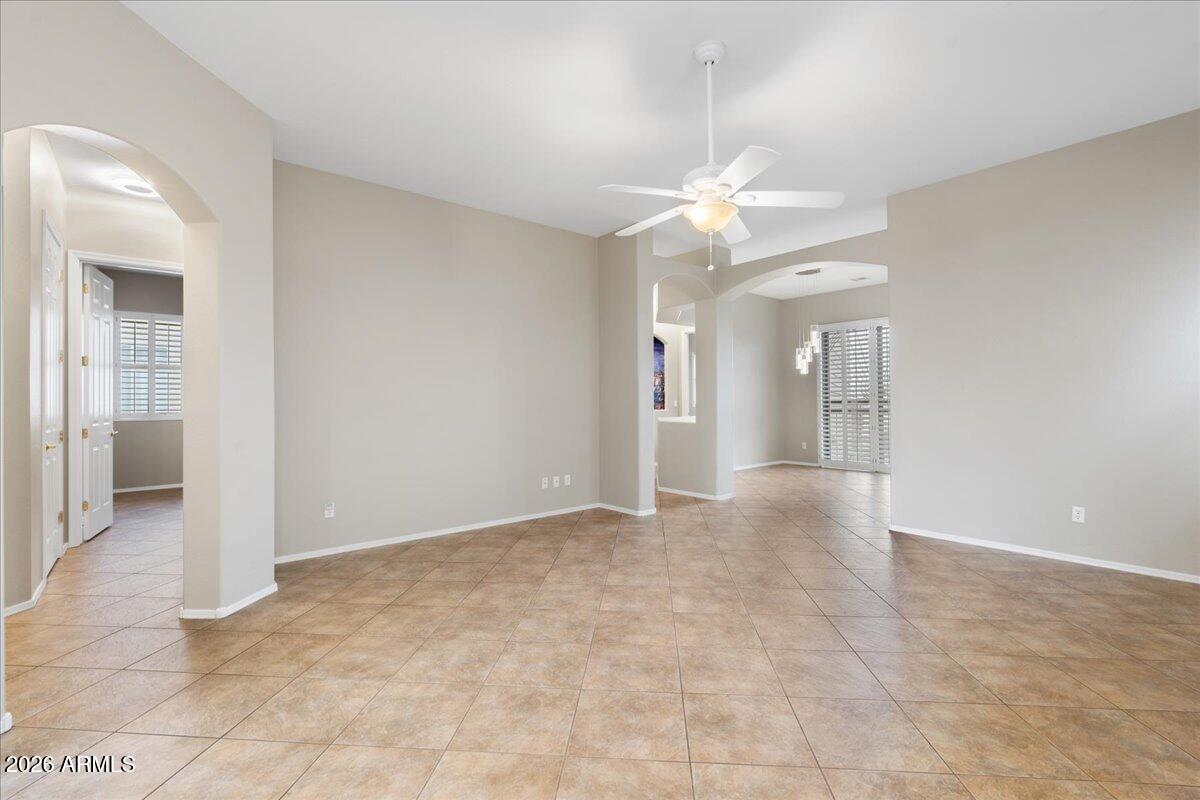 892 West Deep Gorge Road Camp Verde, AZ 86322 - Photo 5 of 38 a view of a big room with chandelier fan and windows