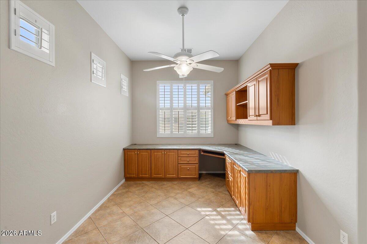 892 West Deep Gorge Road Camp Verde, AZ 86322 - Photo 7 of 38 a spacious bathroom with a granite countertop sink a mirror and a bathtub
