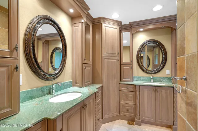 a living room with furniture wooden floor and a flat screen tv