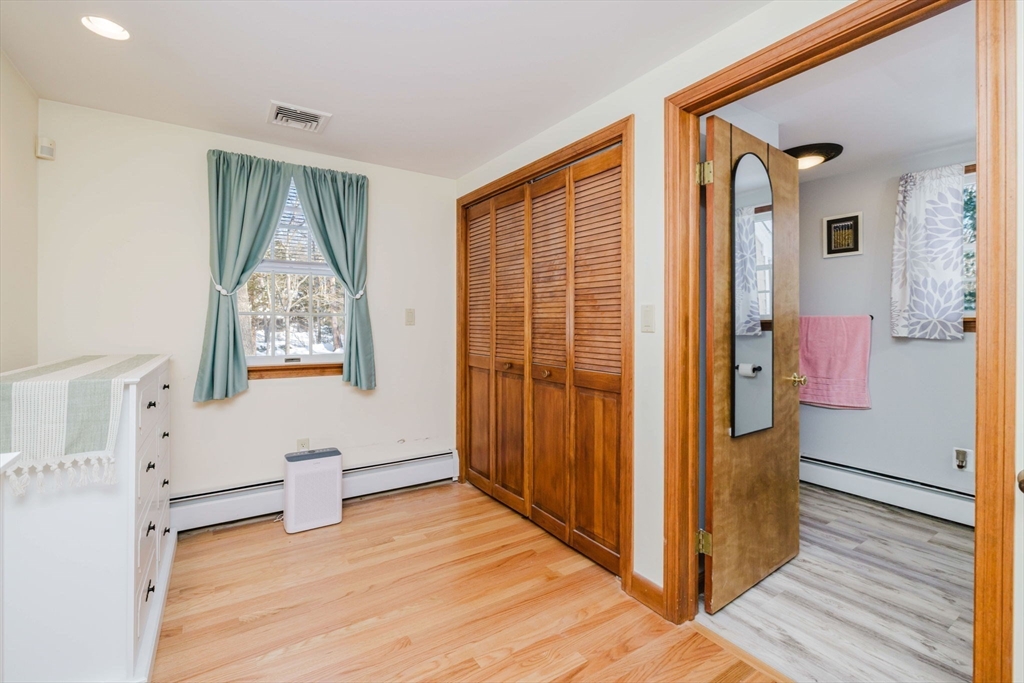 185 Moulton Street Rehoboth, MA 02769 - Photo 18 of 40 a view of livingroom with furniture and wooden floor
