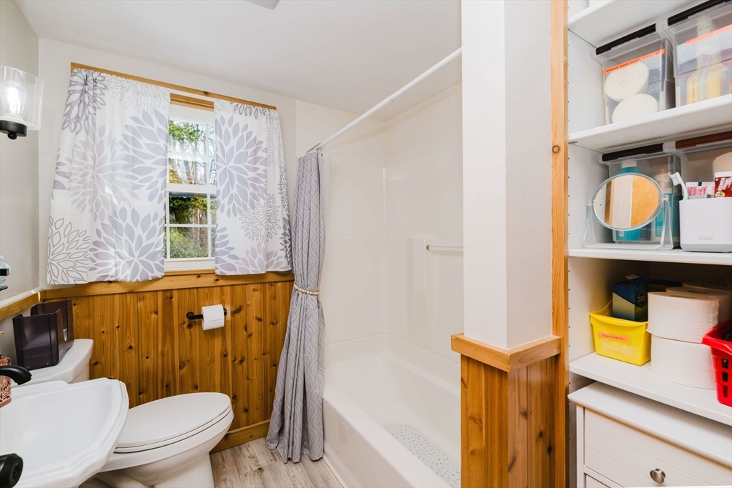 185 Moulton Street Rehoboth, MA 02769 - Photo 24 of 40 a bathroom with a toilet a sink and a mirror