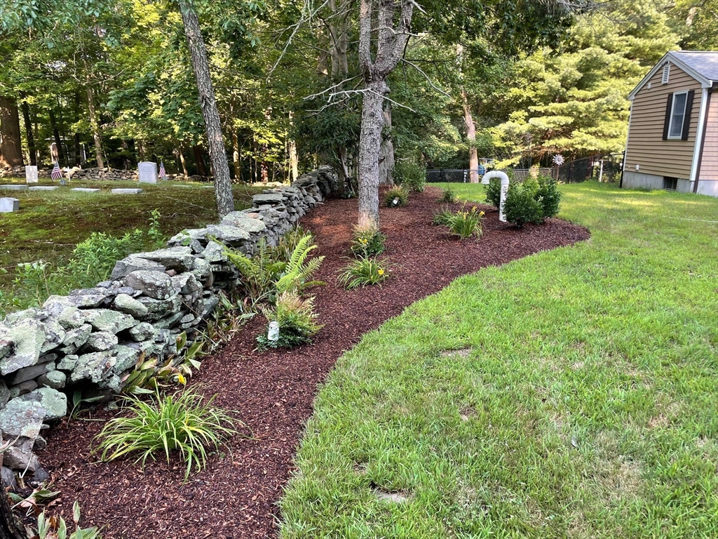 185 Moulton Street Rehoboth, MA 02769 - Photo 29 of 40 a backyard of a house with lots of green space