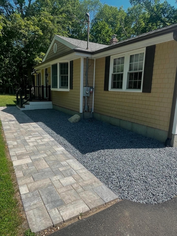 185 Moulton Street Rehoboth, MA 02769 - Photo 30 of 40 a front view of a house with garden