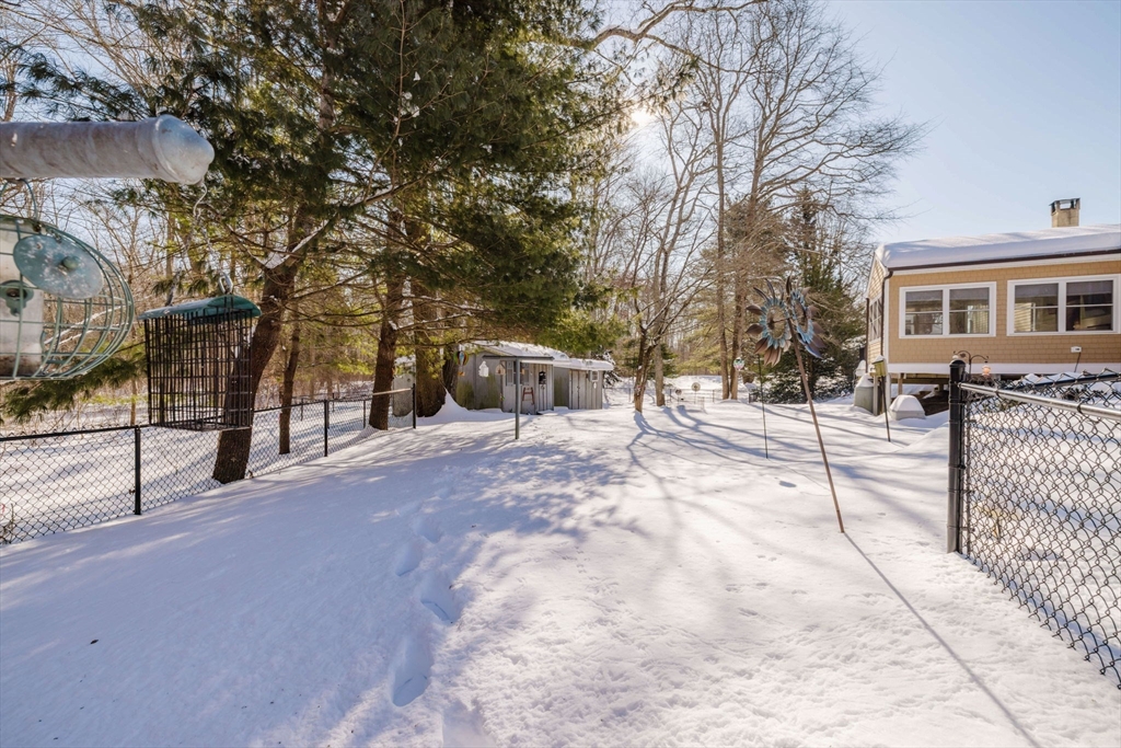 185 Moulton Street Rehoboth, MA 02769 - Photo 35 of 40 a view of a building with a bench
