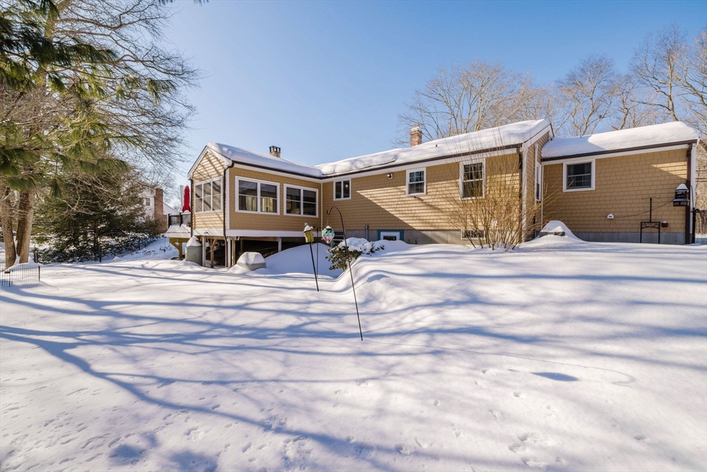 185 Moulton Street Rehoboth, MA 02769 - Photo 4 of 40 a view of a house with snow on the road