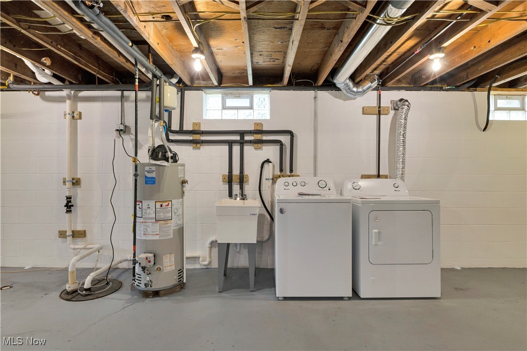 3071 Call Road Stow, OH 44224 - Photo 19 of 25 Laundry room with washing machine and clothes dryer and water heater
