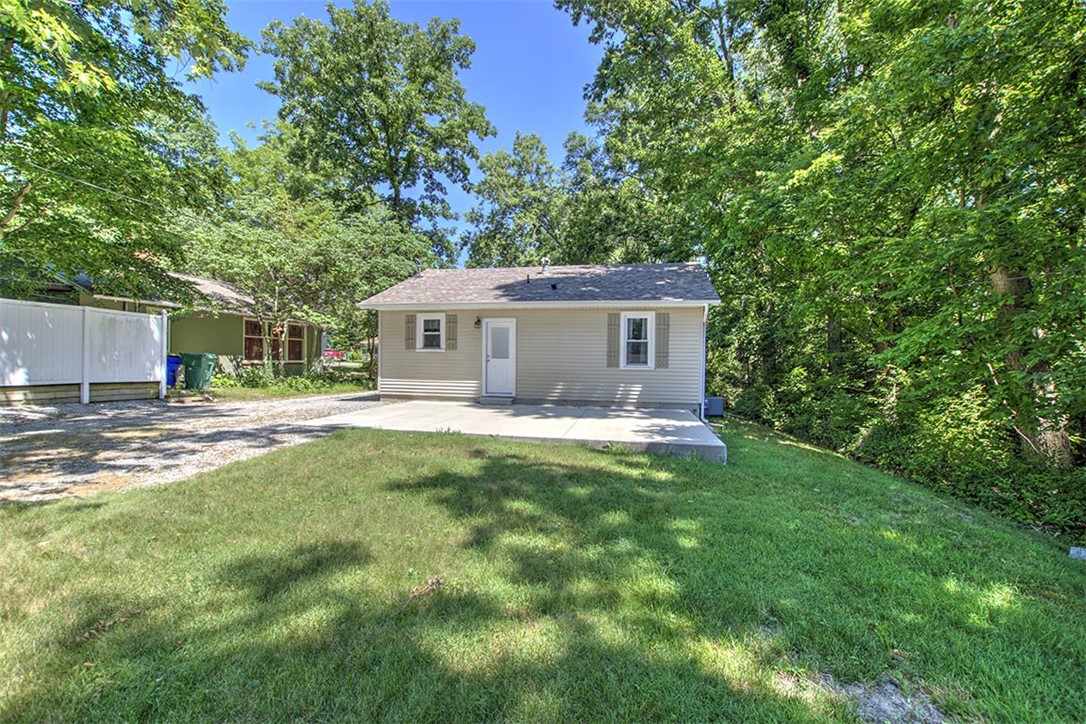 2925 East Main Street Decatur, IL 62521 - Photo 17 of 20 a view of a house with a backyard
