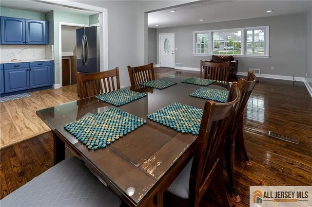 a view of a livingroom with furniture a livingroom and chandelier