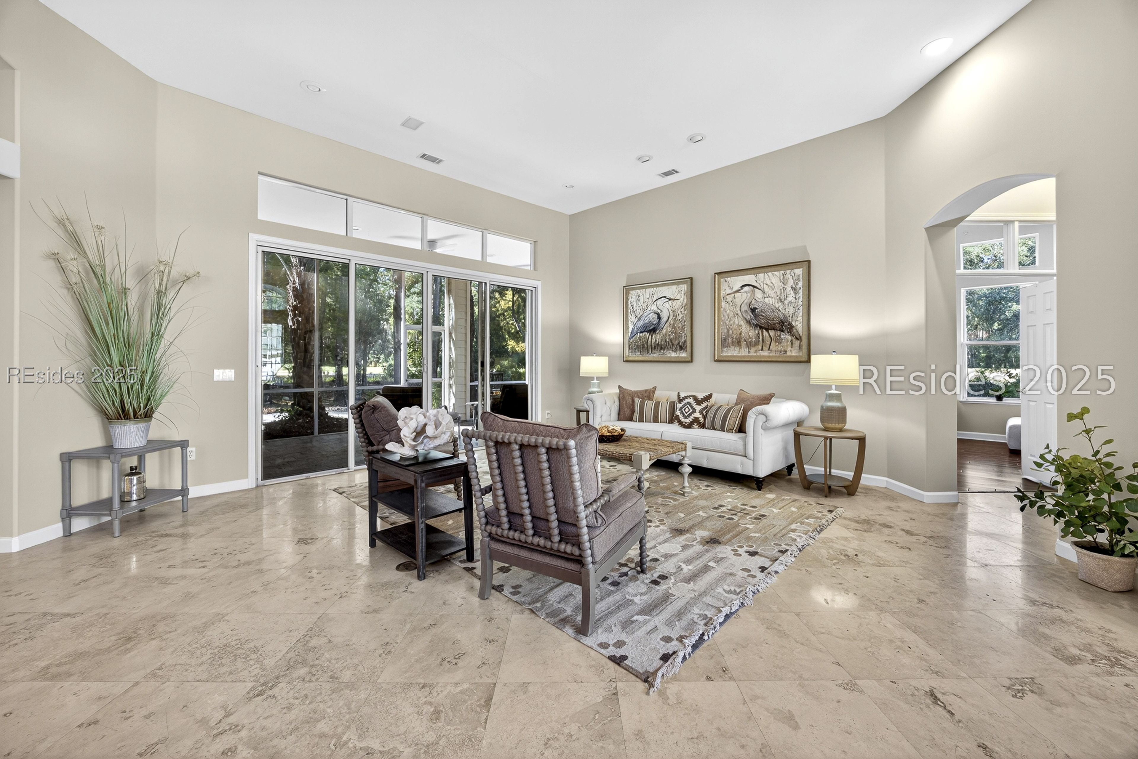109 General Drayton Street Bluffton, SC 29909 - Photo 3 of 66 Elegant Living room with travertine floors
