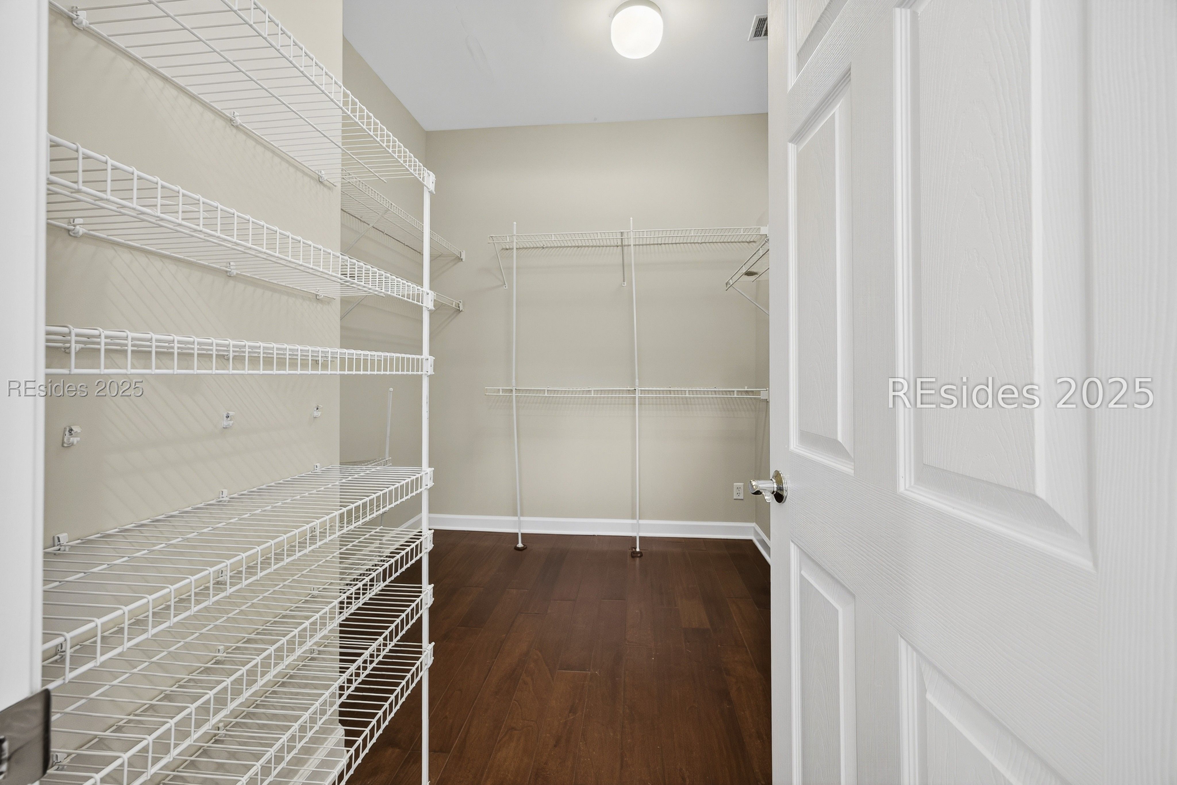 109 General Drayton Street Bluffton, SC 29909 - Photo 34 of 66 Walk-in closet with extra space behind the door