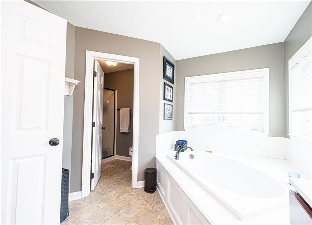 132 Granite Ridge Circle Mars, PA 16046 - Photo 19 of 25 Separate space for the commode and walk-in shower!