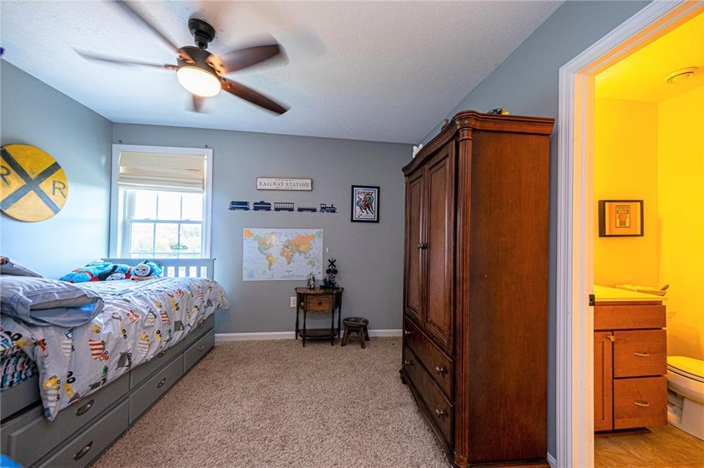 132 Granite Ridge Circle Mars, PA 16046 - Photo 20 of 25 This bedroom is a great space; complete with its own full bathroom. An ideal space for overnight guests!