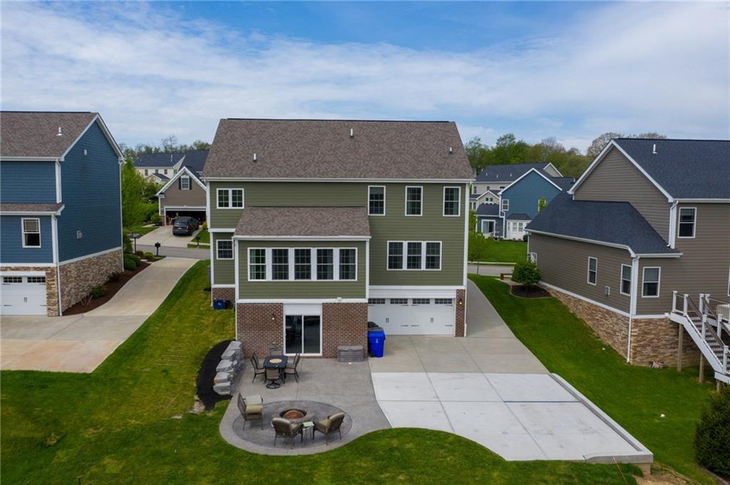 132 Granite Ridge Circle Mars, PA 16046 - Photo 25 of 25 This home has a walk-out basement leading to the exposed aggregate patio and extended drive-way that was just added in 2019. Hardiplank and brick exterior. Overall an amazing home! Built by Heartland Homes.