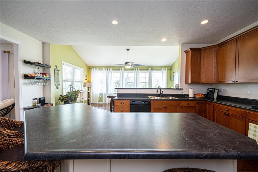 132 Granite Ridge Circle Mars, PA 16046 - Photo 6 of 25 The Chef's kitchen has beautiful shaker cabinetry, and a large L-shaped center island. Great for preparing family dinners!
