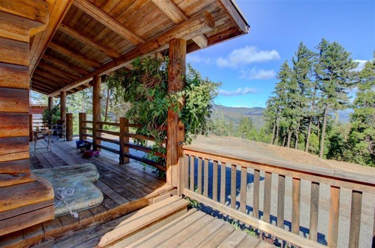 267 Citadel Road Trail, OR 97541 - Photo 26 of 30 a view of a porch with wooden floor