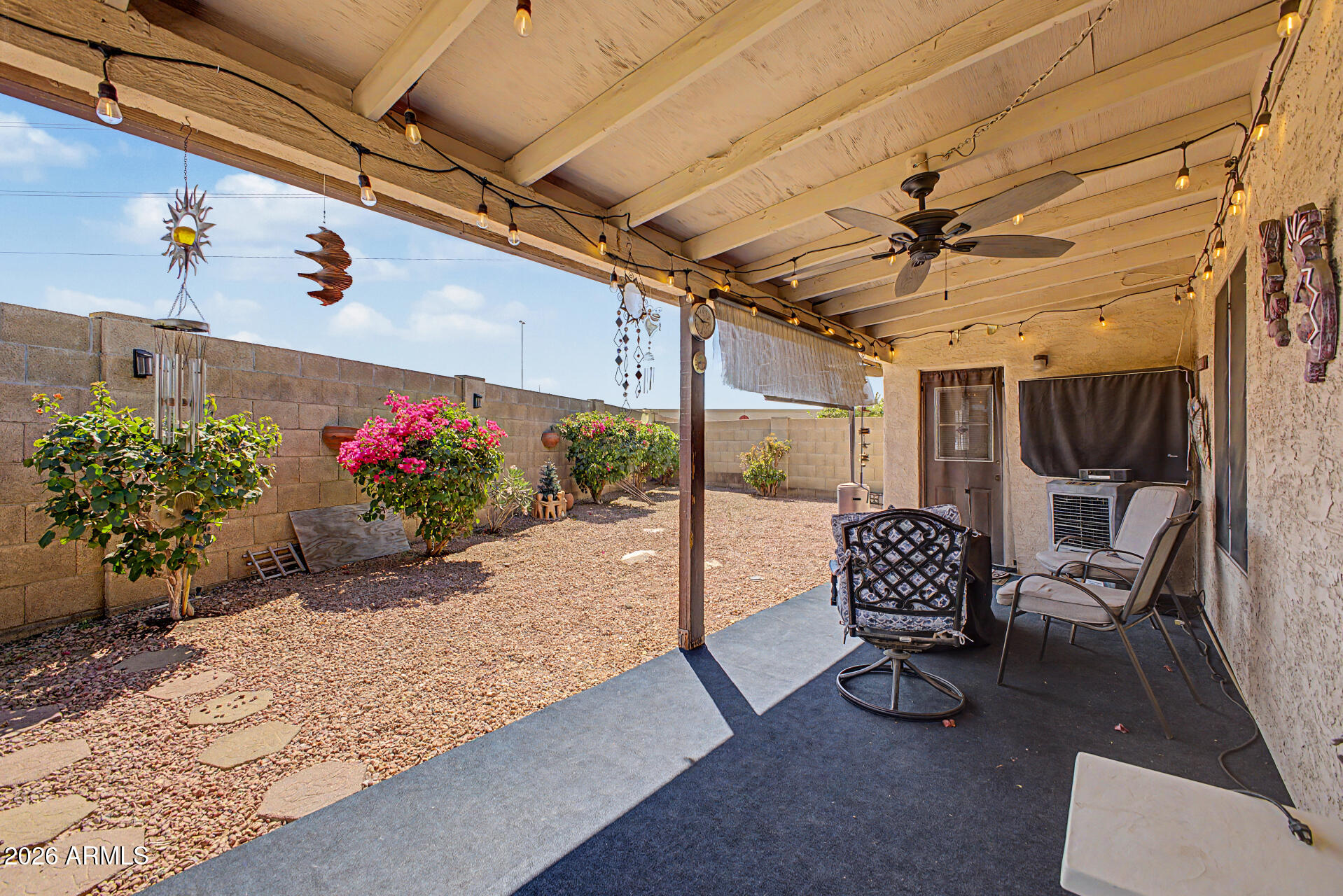 2659 West Hearn Road Phoenix, AZ 85023 - Photo 22 of 25 a outdoor space with lots of furniture and flowers