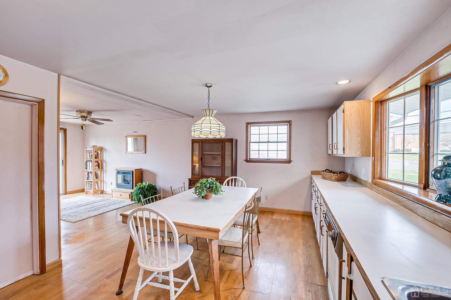143 Princeton Road Old Bridge, NJ 08859 - Photo 9 of 32 a view of a dining room with furniture window and wooden floor