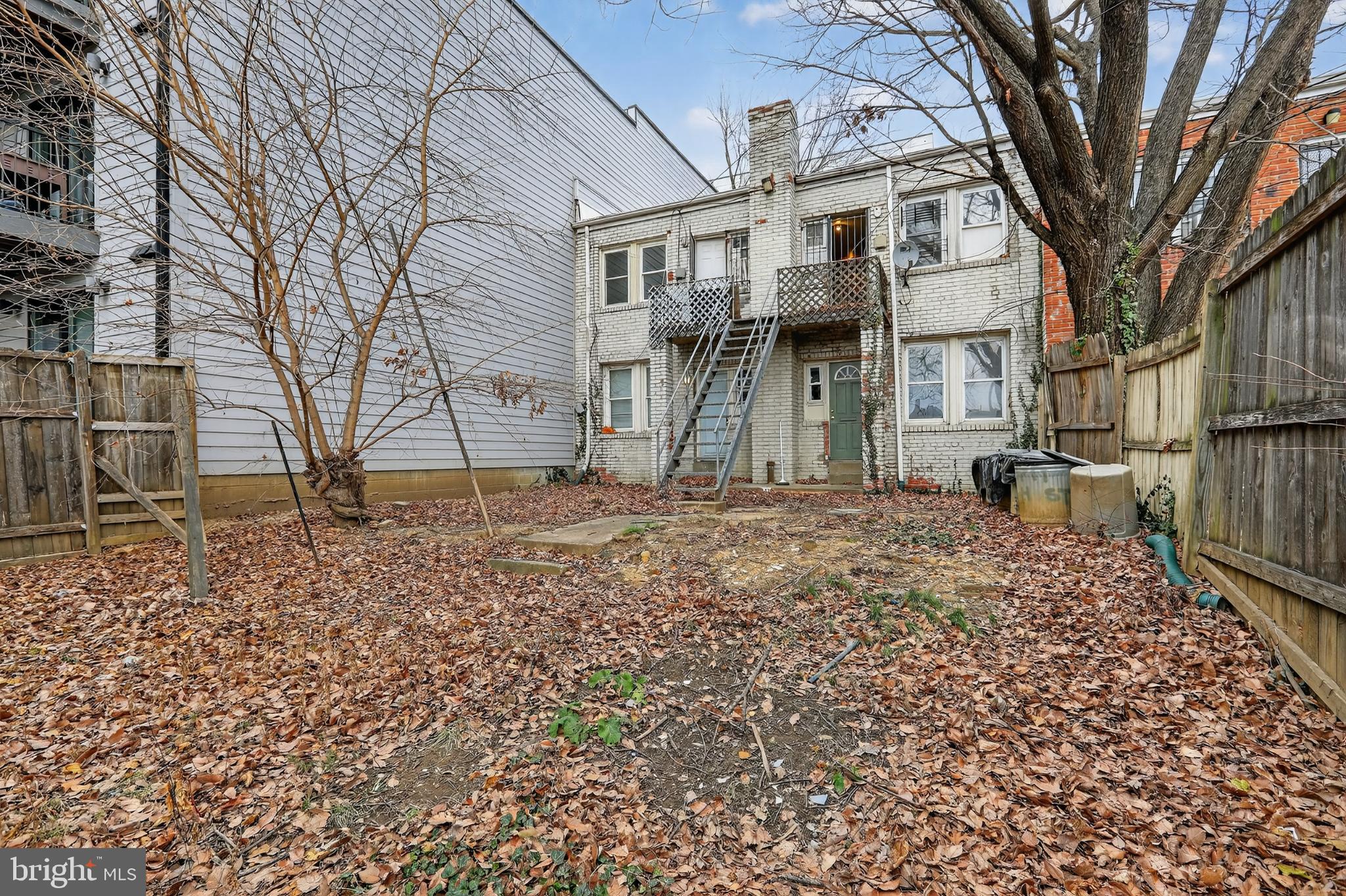 1711 H Street Northeast Washington, DC 20002 - Photo 2 of 15 a backyard of a house with lots of green space