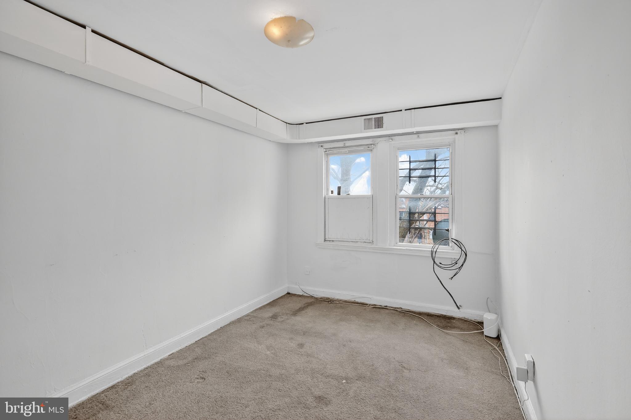 1711 H Street Northeast Washington, DC 20002 - Photo 10 of 15 a view of a room with racks on the wall