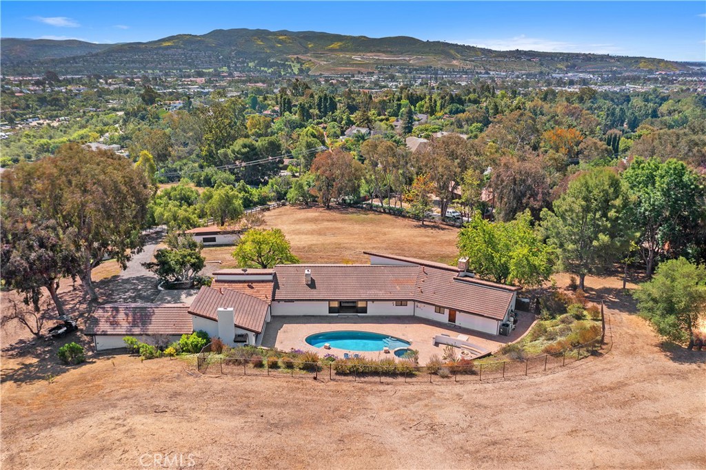 31401 Aguacate Road San Juan Capistrano, CA 92675 - Photo 1 of 1 an aerial view of a house with a yard
