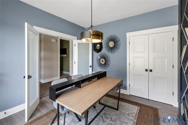 a room with a table and chairs