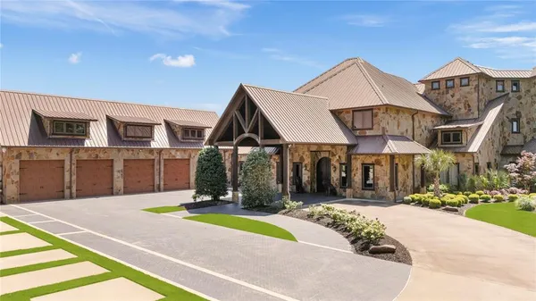 a view of large house with a yard