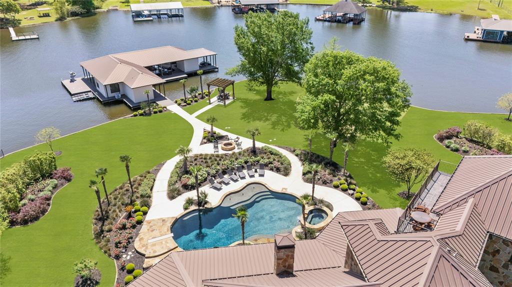 17873 Slack Road Whitehouse, TX 75791 - Photo 3 of 24 an aerial view of a house with a yard and lake view