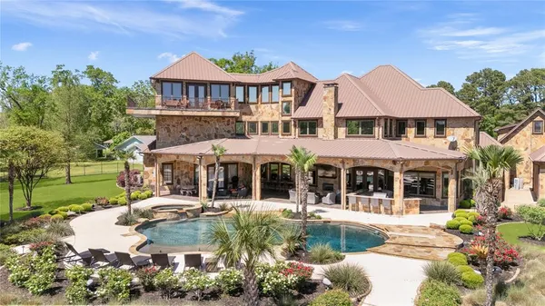 front view of a building with a garden