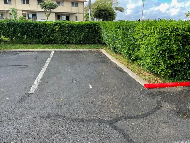 a view of a street with a building