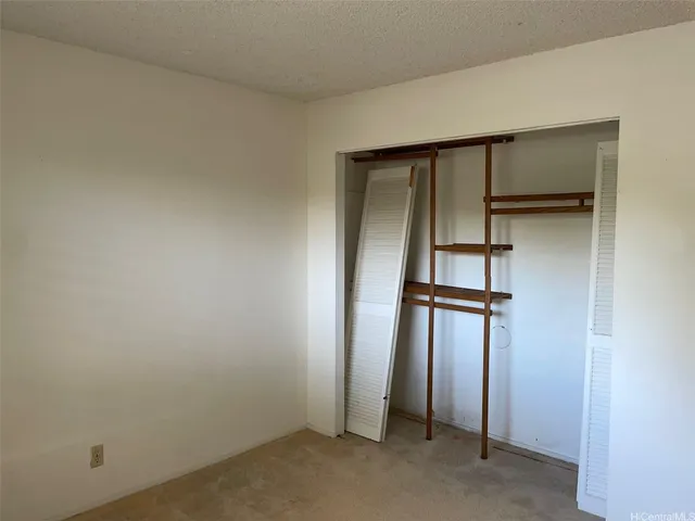 an empty room with closet
