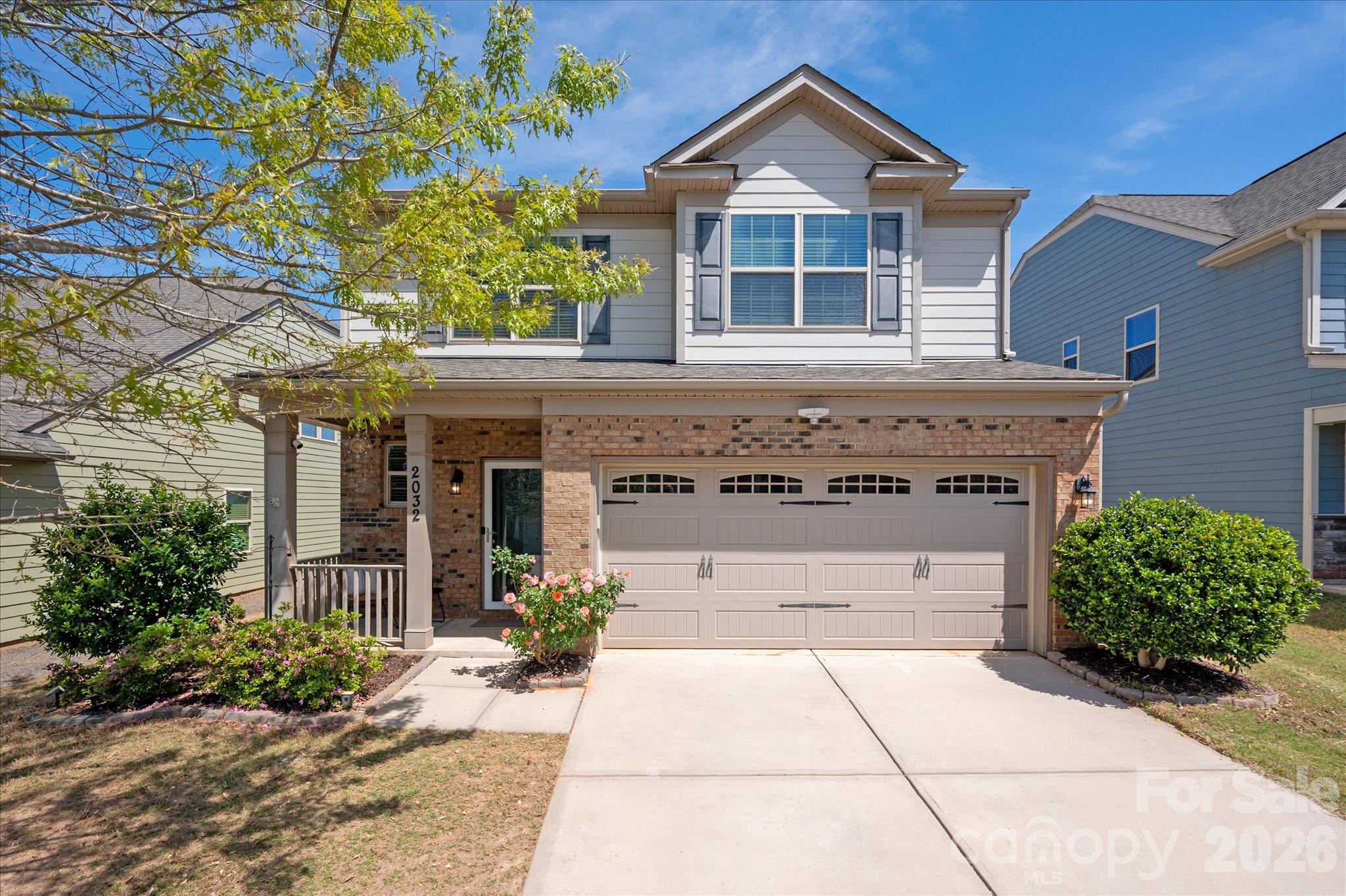 2032 Pinyon Lane Lancaster, SC 29720 - Photo 2 of 44 a front view of a house with garden