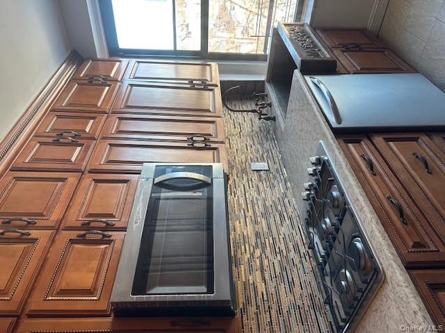 100 Pelham Road, Unit 2B New Rochelle, NY 10805 - Photo 13 of 13 a kitchen with stainless steel appliances granite countertop a sink stove and cabinets