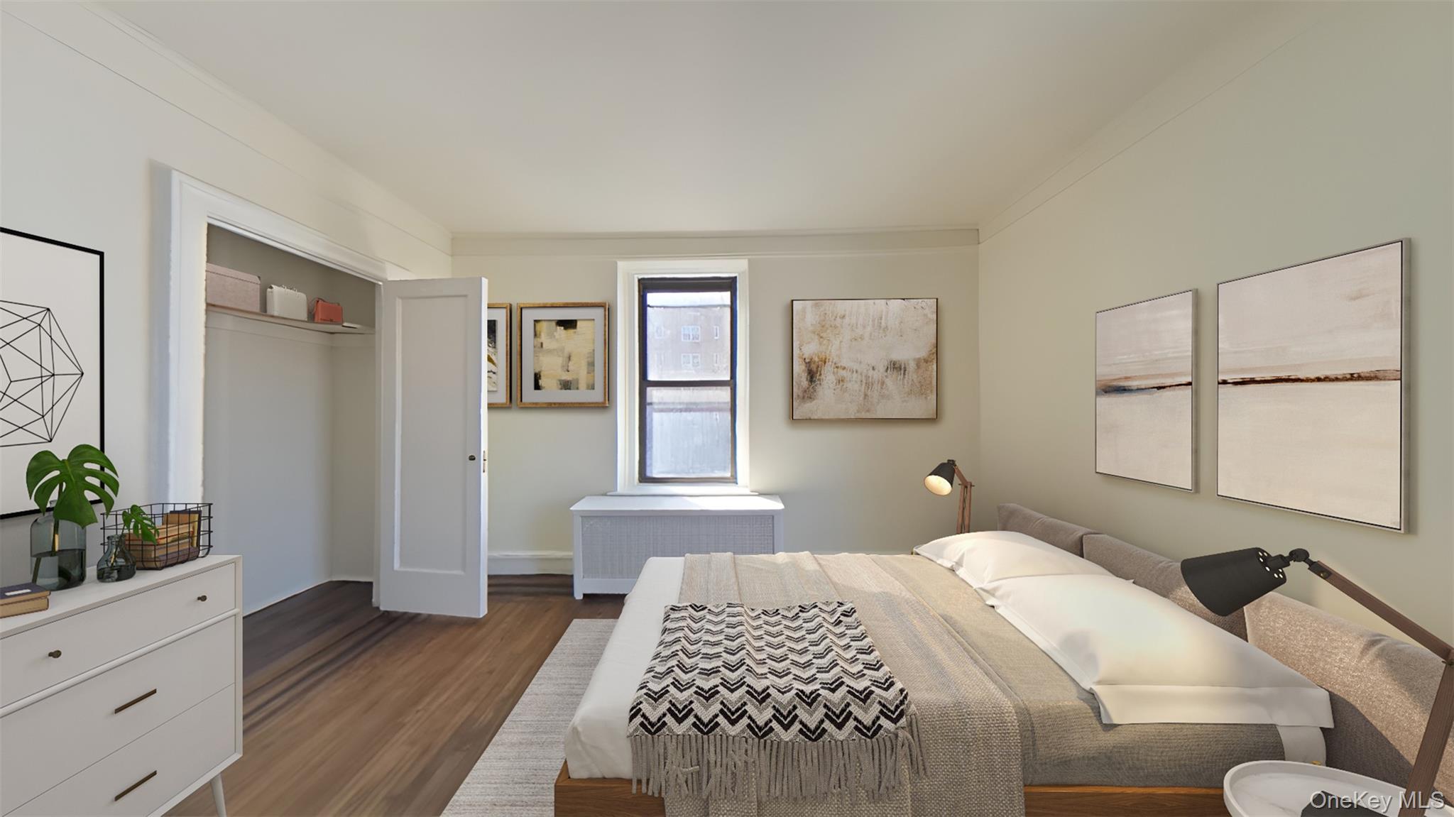 100 Pelham Road, Unit 2B New Rochelle, NY 10805 - Photo 3 of 13 a bedroom with a bed and painting on the wall