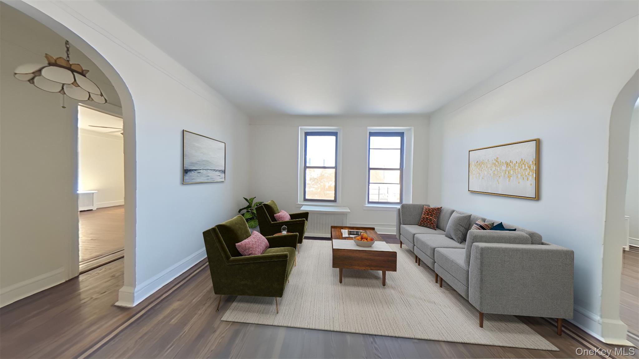 100 Pelham Road, Unit 2B New Rochelle, NY 10805 - Photo 7 of 13 a living room with furniture and a window