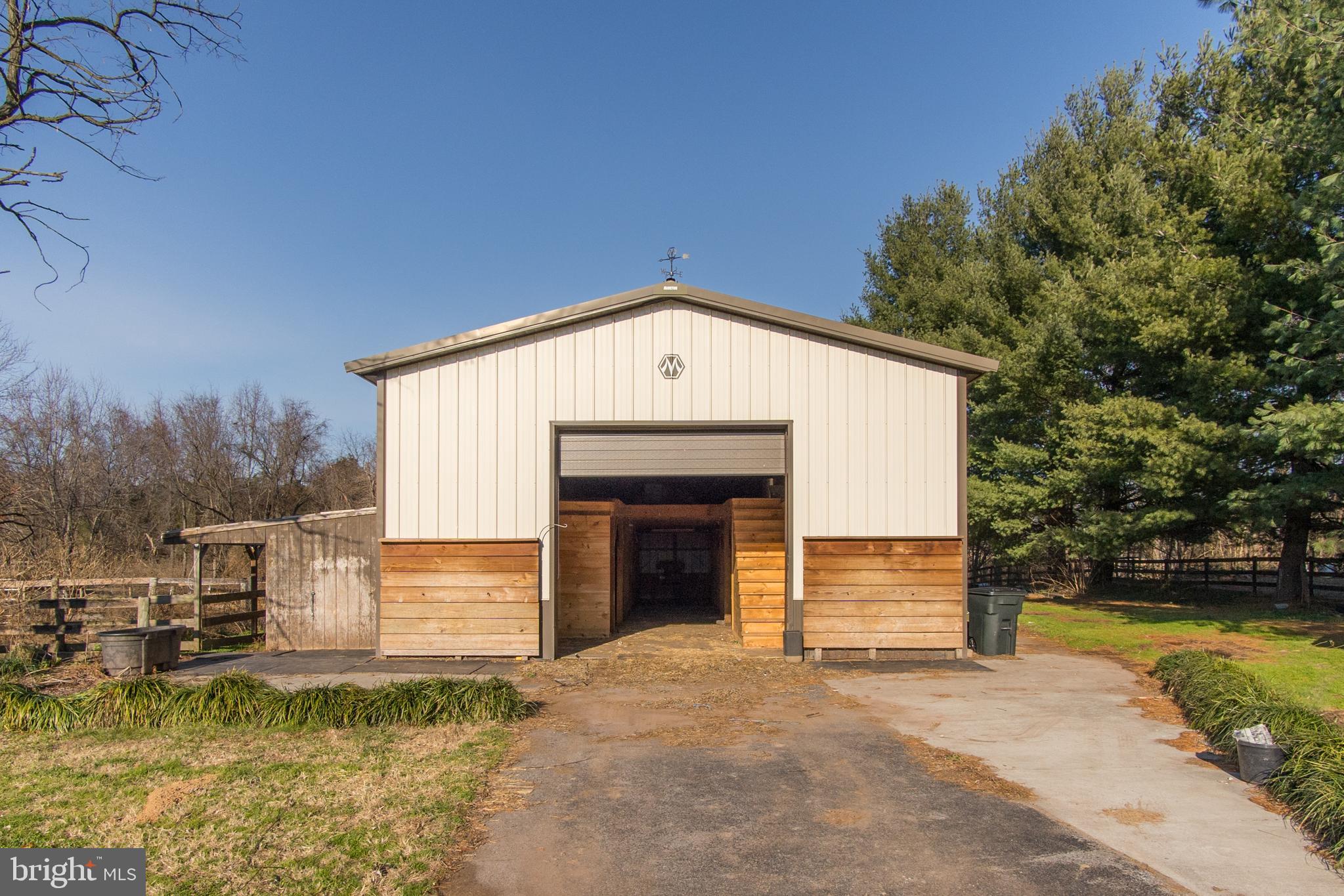 1404-1406 Pleasant View Road Adamstown, MD 21710 - Photo 83 of 113 30x60 Morton Building - new 12' door