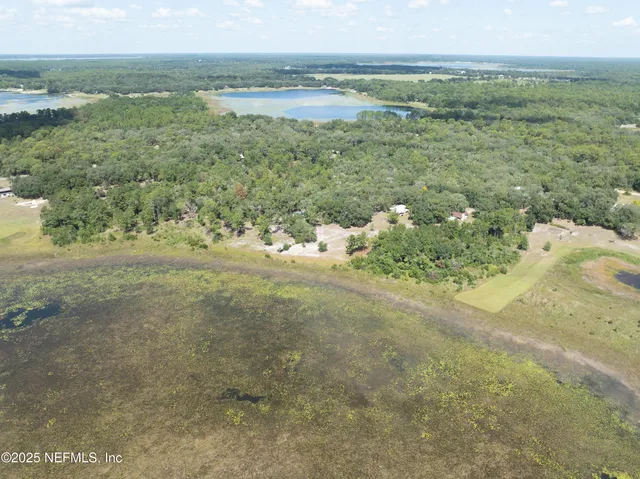 a view of a road with an ocean beach