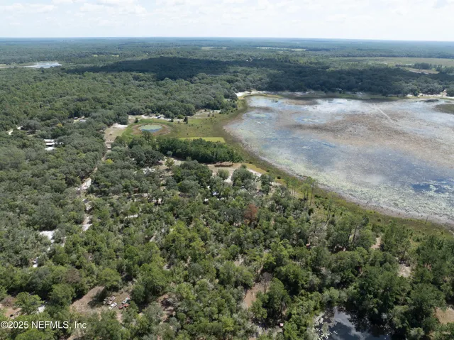 a view of a yard with an outdoor space