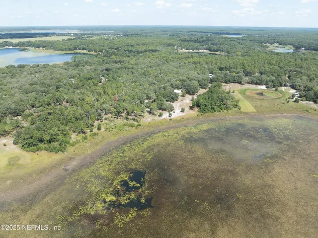 a view of a yard with an outdoor space