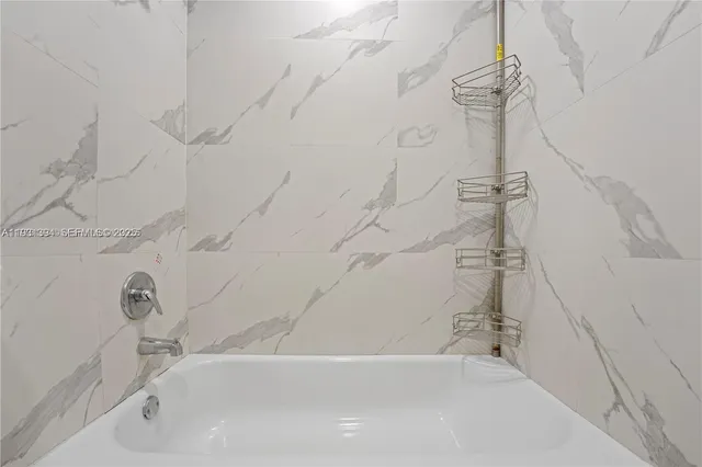 a bathroom with a bathtub