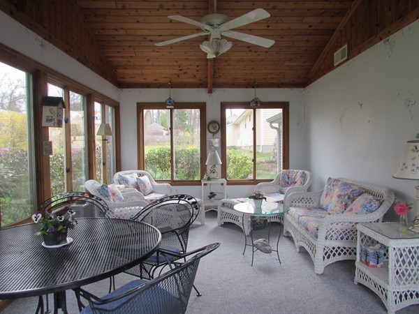 54 Endecott Street Springfield, MA 01118 - Photo 18 of 23 a living room with furniture and a floor to ceiling window