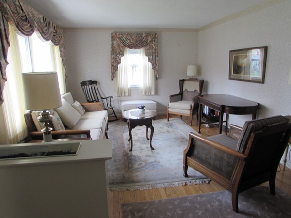 54 Endecott Street Springfield, MA 01118 - Photo 8 of 23 a living room with furniture and a large window