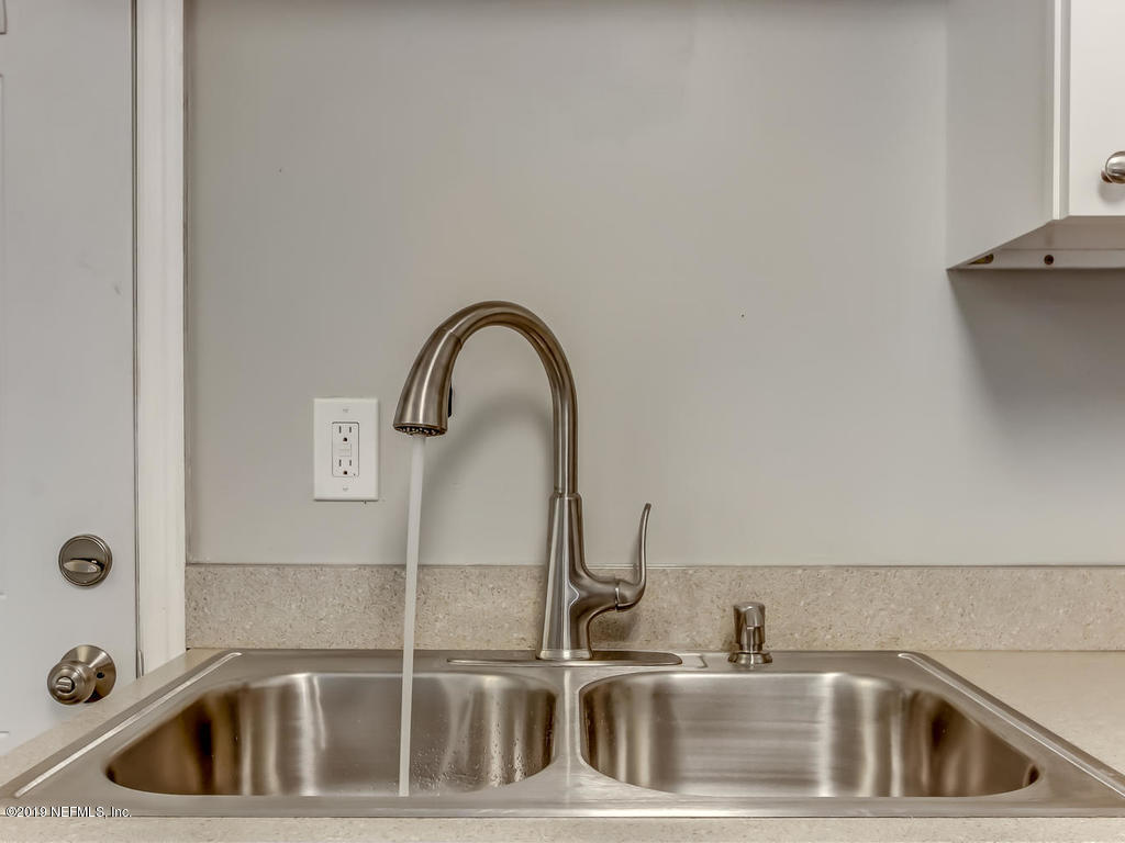 2165 Tuskegee Road Jacksonville, FL 32209 - Photo 11 of 32 a close view of sink and tap
