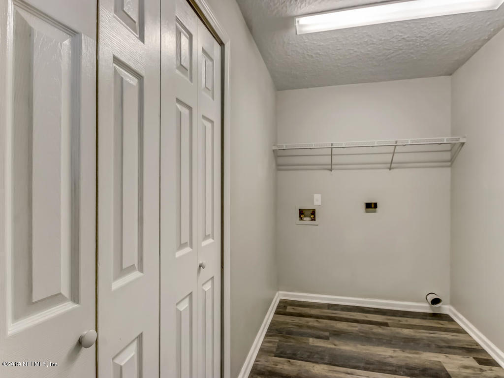 2165 Tuskegee Road Jacksonville, FL 32209 - Photo 16 of 32 a view of staircase with white walls