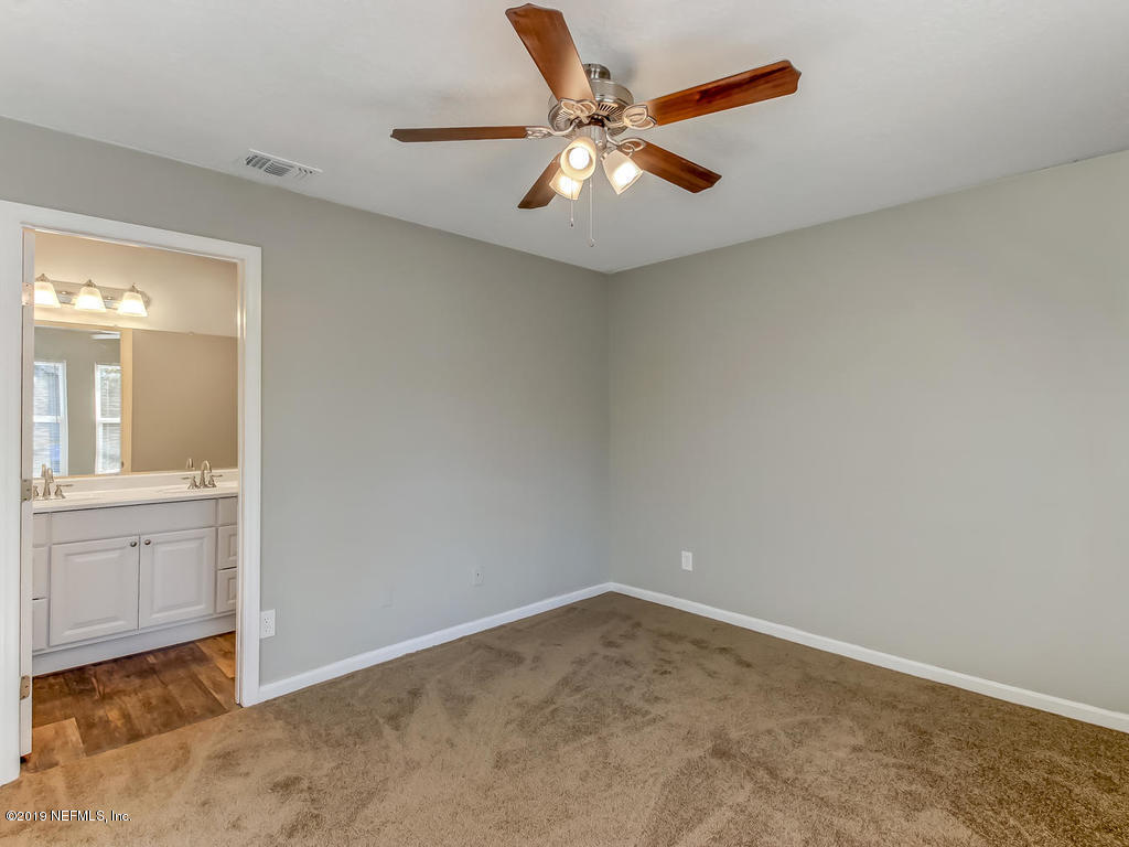 2165 Tuskegee Road Jacksonville, FL 32209 - Photo 19 of 32 an empty room with a bathroom