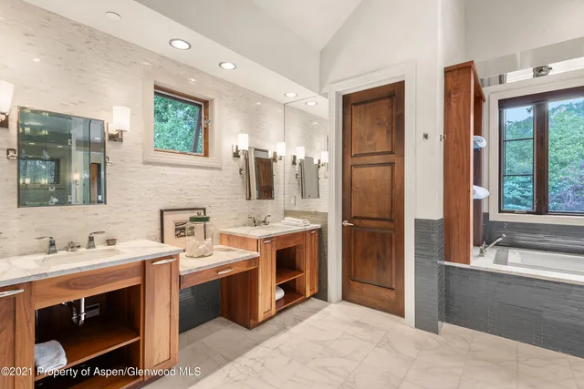 a kitchen with a sink stove and refrigerator
