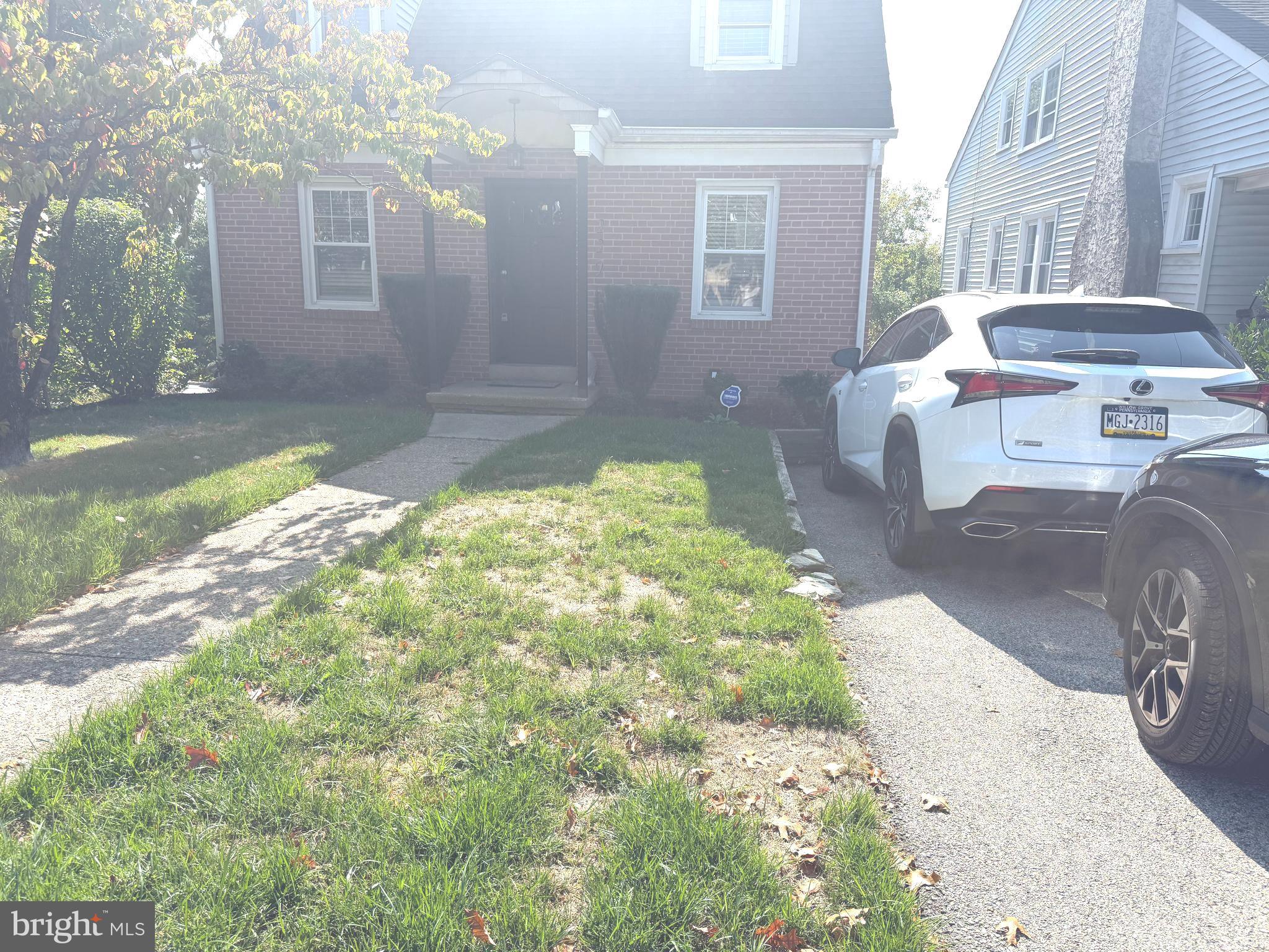 229 Edge Hill Road Glenside, PA 19038 - Photo 2 of 25 a front view of a house with garden