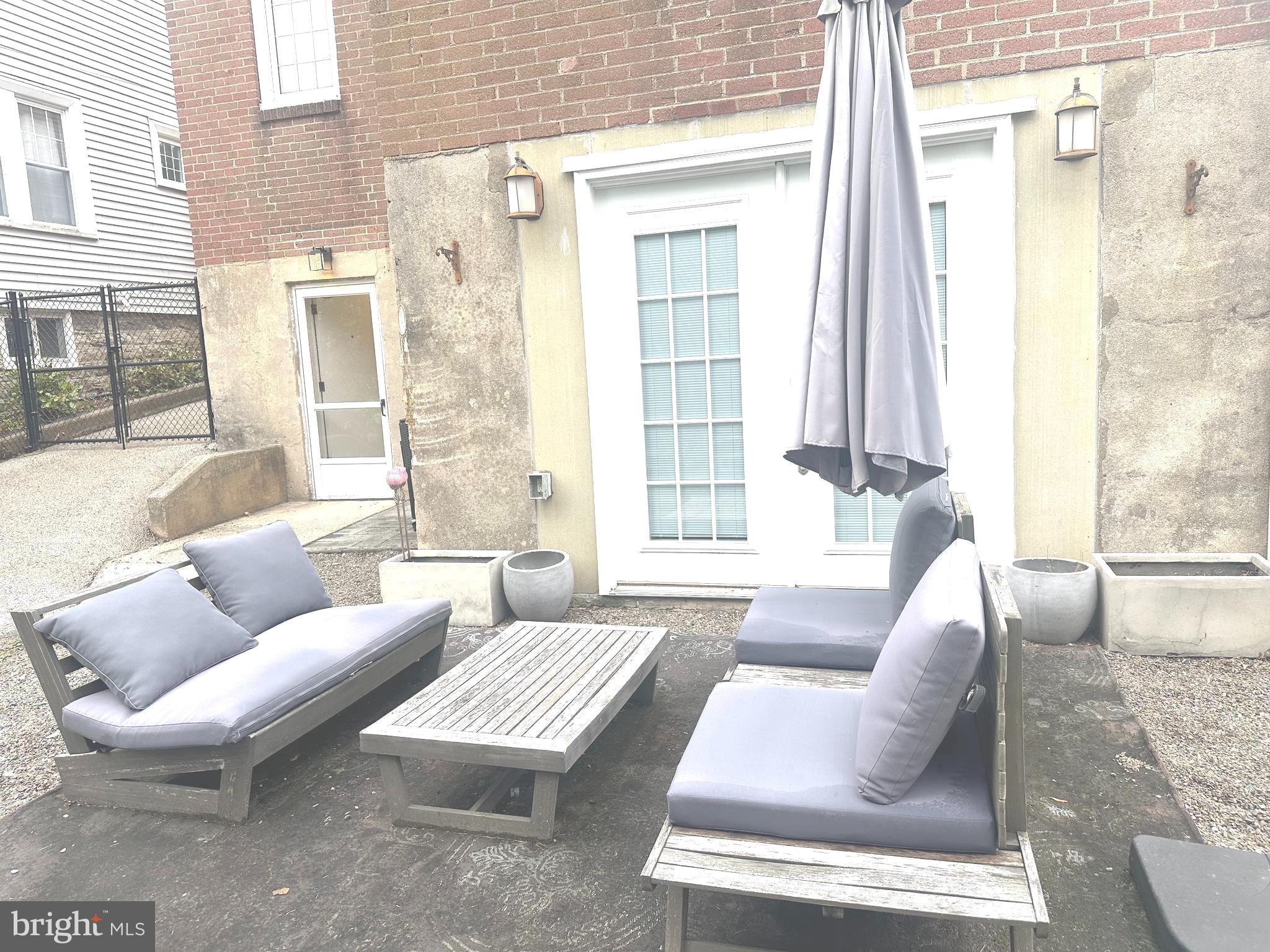 229 Edge Hill Road Glenside, PA 19038 - Photo 24 of 25 a living room with furniture and a large window